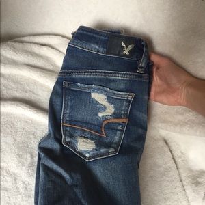 AE super stretch distressed denim w frayed hem